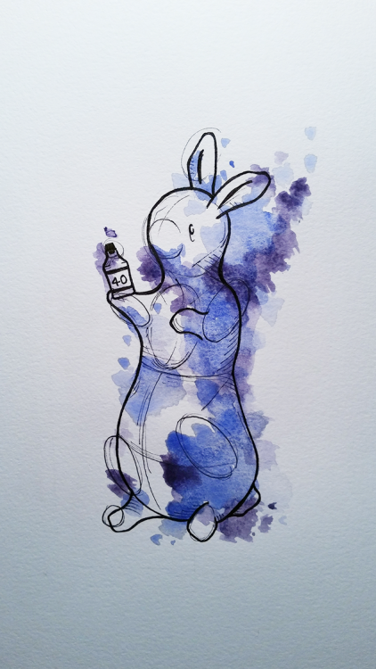 Black-contour rabbit with blue watercolor fur tattoo design