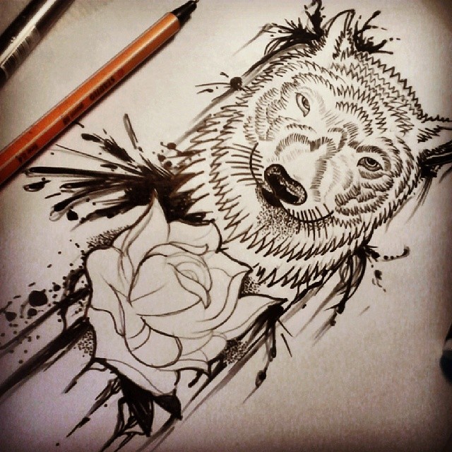Black-contour wolf and a rose in smudges tattoo design
