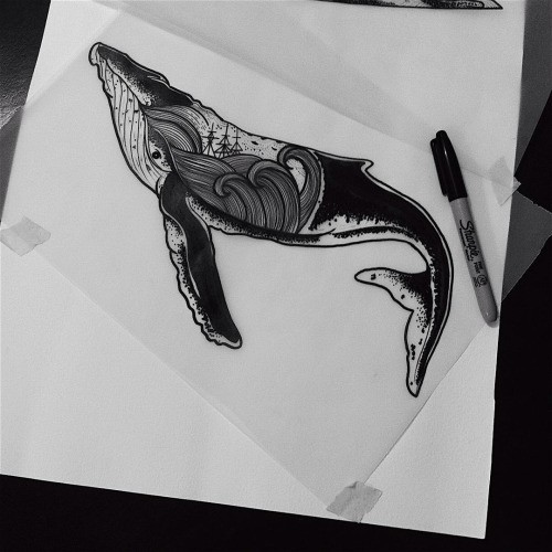 Black-ink whale with marine view pattern tattoo design