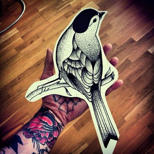Black dotwork sparrow sitting on branch tattoo design