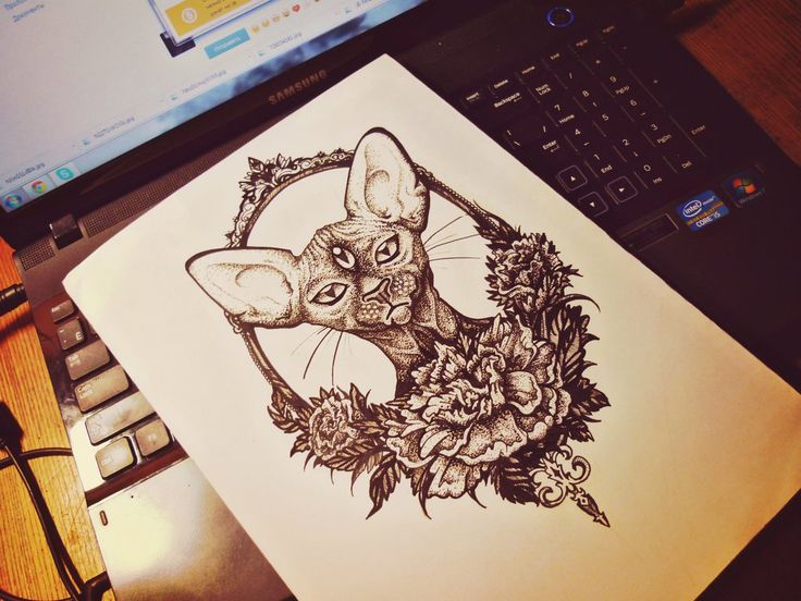 Black dotwork three-eyed sphynx cat in flowered frame tattoo design