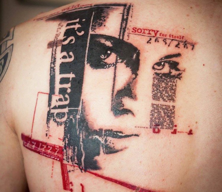 Tatuaggio scapolare di donna con inchiostro nero stile spazzatura