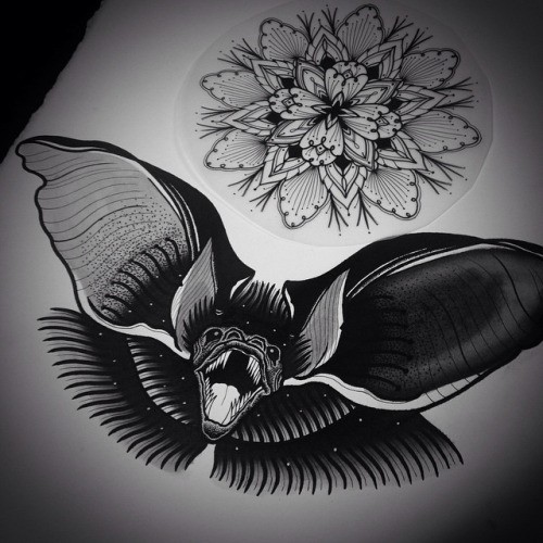 Black screaming attacking bat and mandala tattoo design