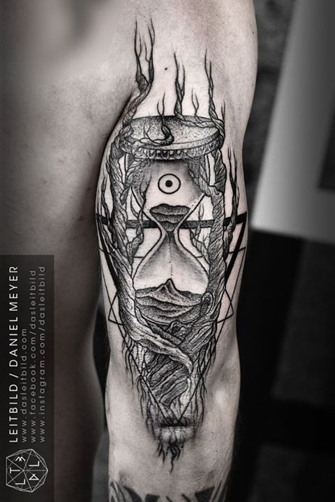 Blackwork hourglass with tree tattoo by daniel meyer