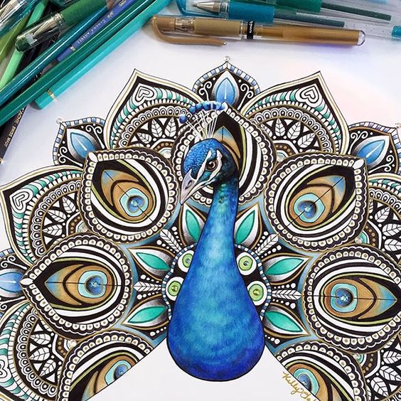 Blue peacock with ornate fan-shaped tail tattoo design