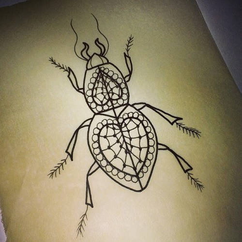 Bonny outline heart-printed bug tattoo design