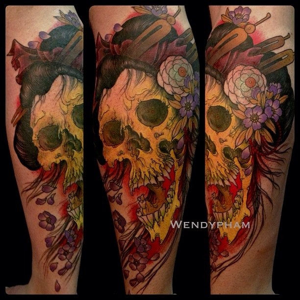 Bright colorful skull of a geisha tattoo