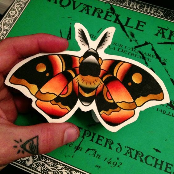 Bright orange old school moth tattoo design