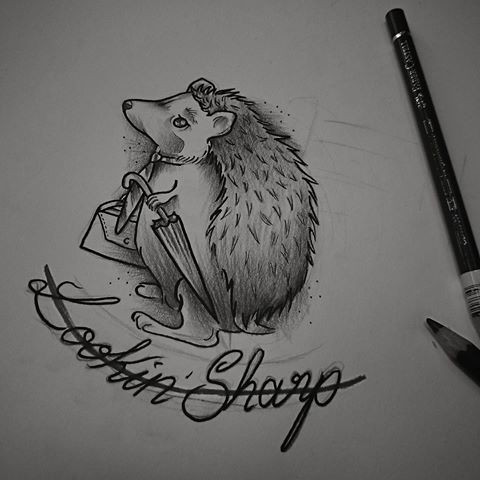 Cartoon hedgehog keeping bag and umbrella with lettering tattoo design