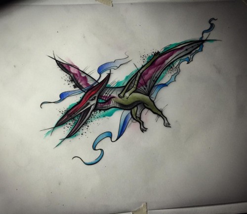 Colored flying dinosaur tattoo design