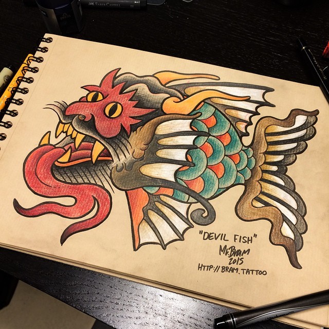 Colorful chinese fish monster tattoo design