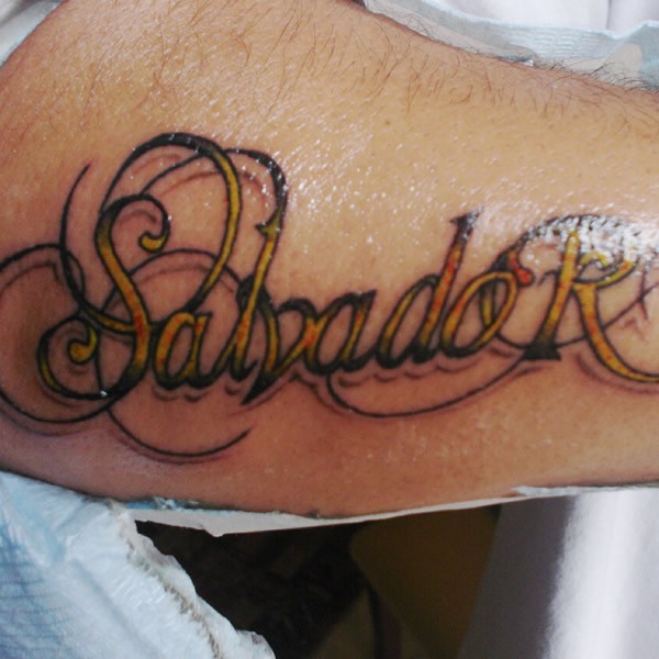 Colorful name quote tattoo for men on arm