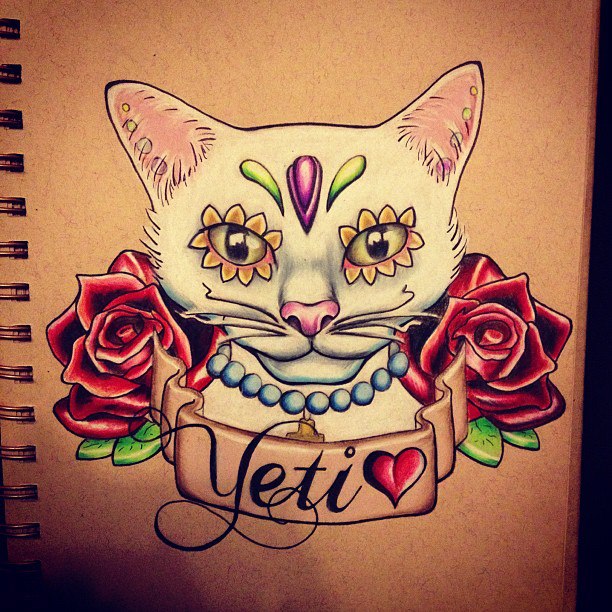 Colorful new school cat with roses and quoted stripe tattoo design