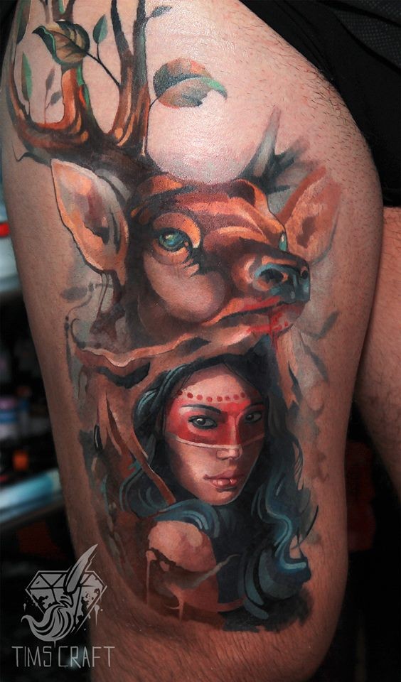 Colorfull deer and woman tatoo on thigh