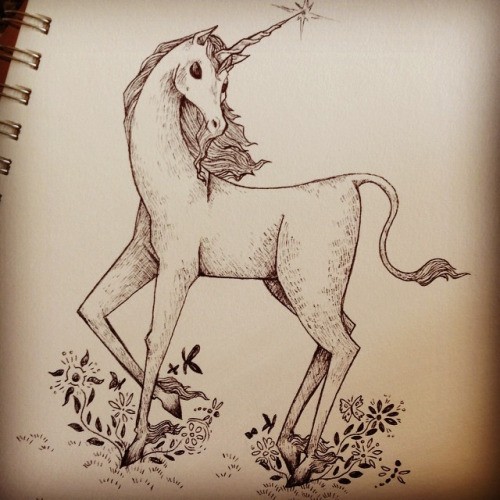 Colorless unicorn putting its hoofs into flowered bushes tattoo design