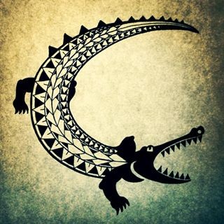 Cool black ornate reptile tattoo design
