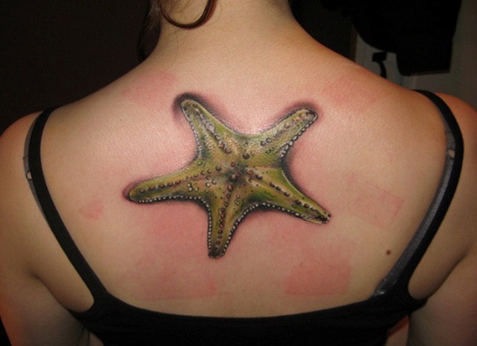 Cool colorful starfish tattoo on back