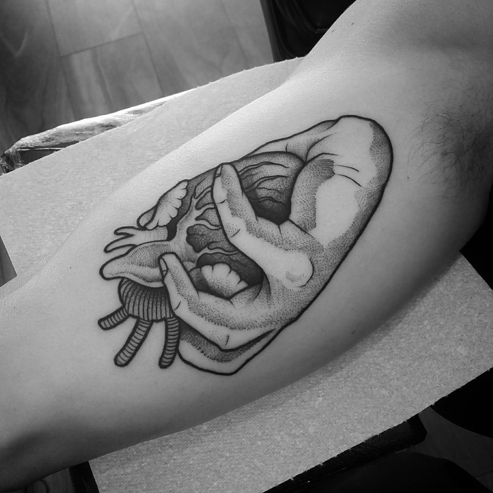 Cool heart in hand dotwork tattoo