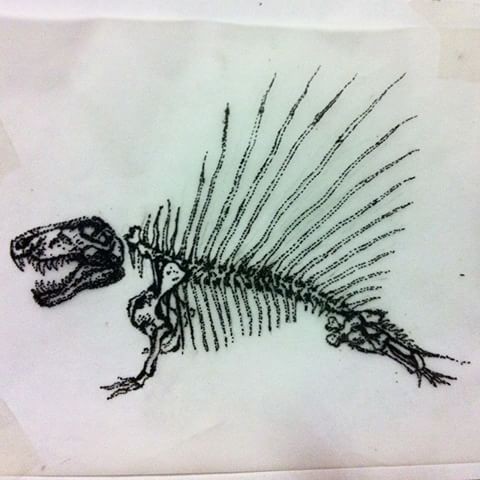 Cool rawring flying dinosaur skeleton tattoo design