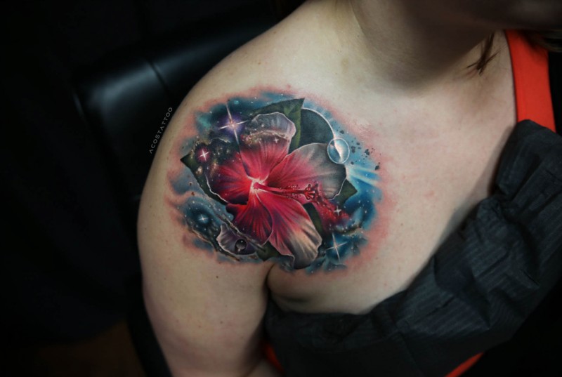 Cool realistic flower in space tattoo on shoulder