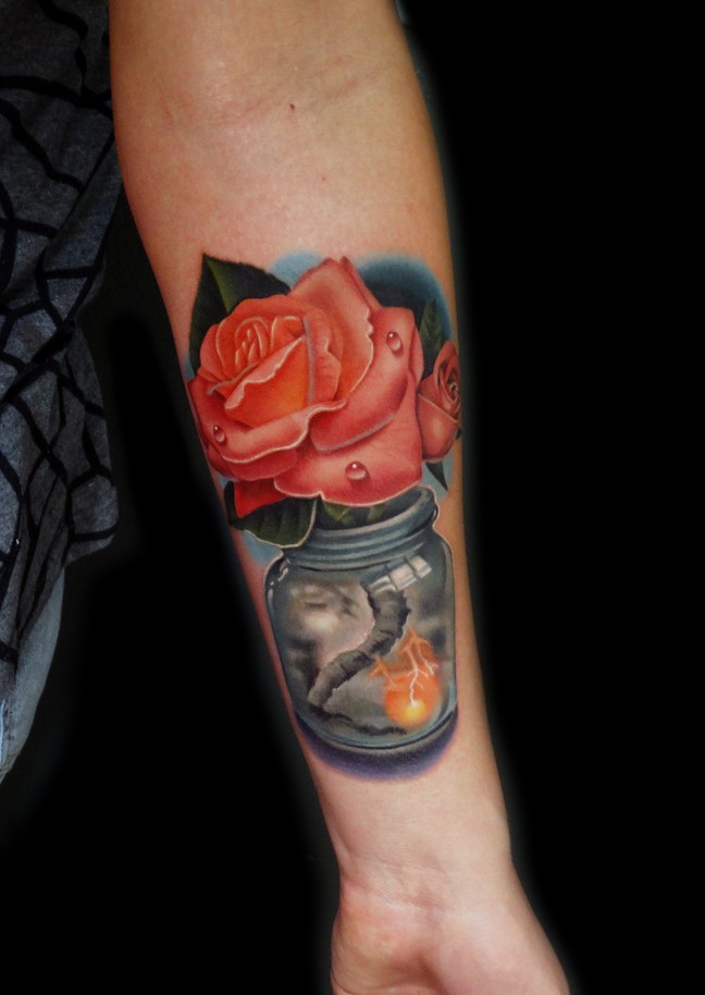 Cool rose tattoo on forearm