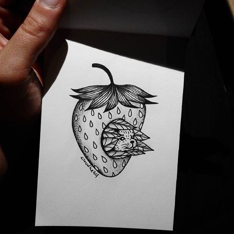 Cool uncolored rodent head looking out of strawberry tattoo design