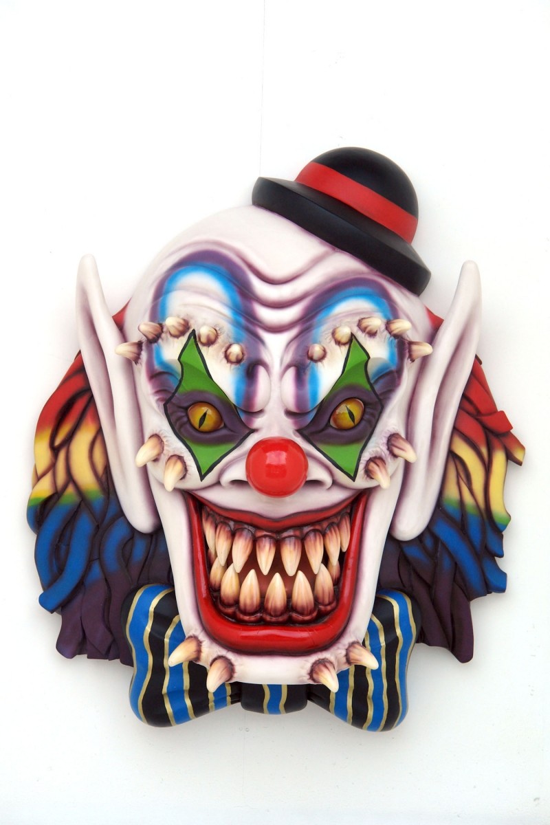 Crazy multicolor demon clawn face tattoo design