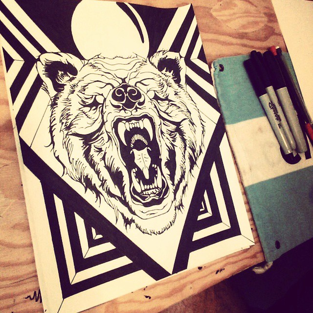 Crazy roaring bear head with geometric lines frame tattoo design