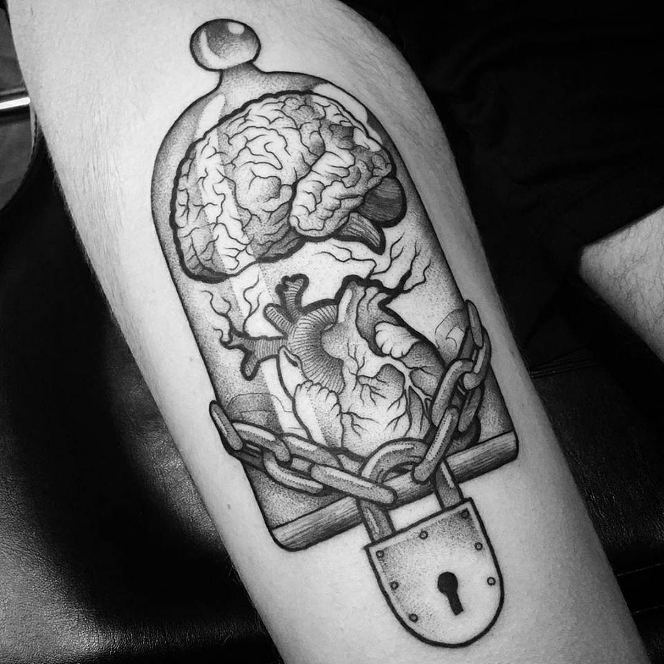 Creative heart and brain tattoo