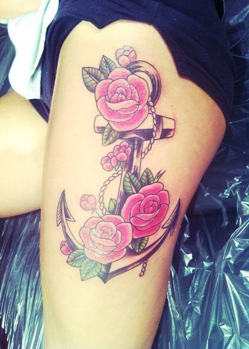 Cute anchor with pink roses tattoo on thigh