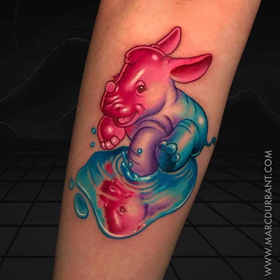 Cute liitle rhino tattoo