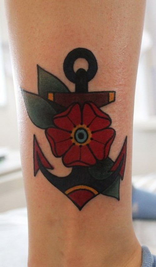 Cute old school anchor with lovely red flower tattoo on shin