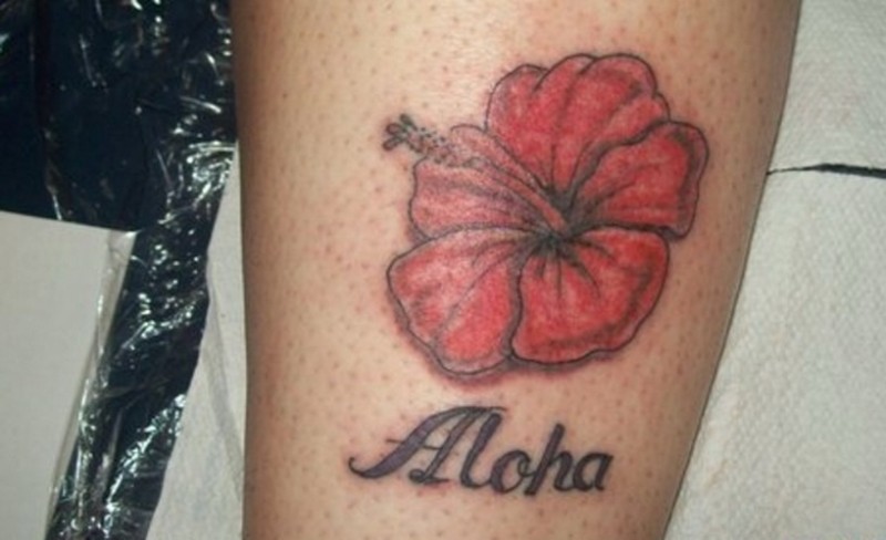 Cute red hawaiian flower with quote tattoo