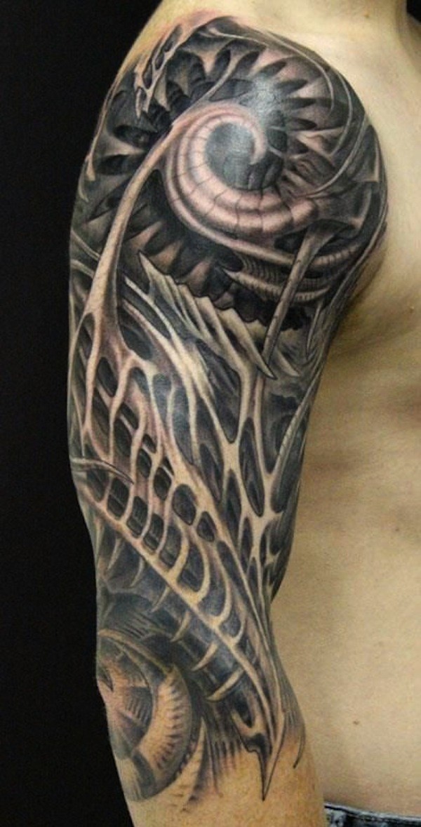 Dark ornamented wired biomechanical tattoo on arm