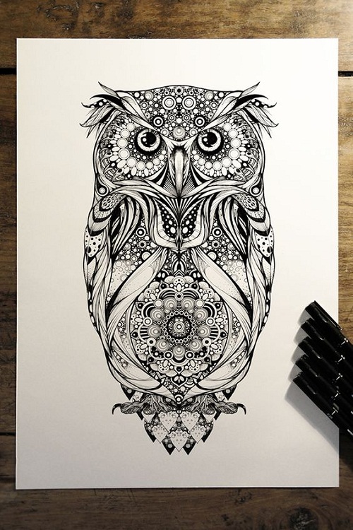Detailed owl with mandala stomach tattoo design