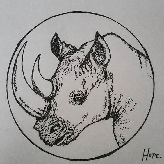 Dotwork-style rhino portrait framed with circle tattoo design