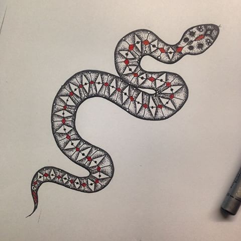 Dotwork crawling snake with red pattern elements tattoo design
