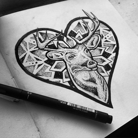 Dotwork deer in heart frame on mandala background tattoo design