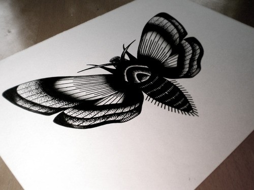 Elegant big black-ink moth tattoo design