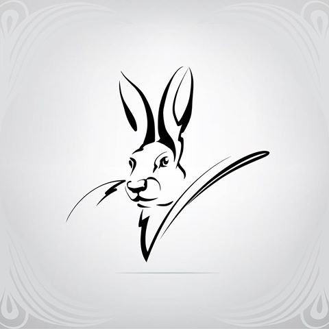 Elegant black-ink tribal hare head tattoo design