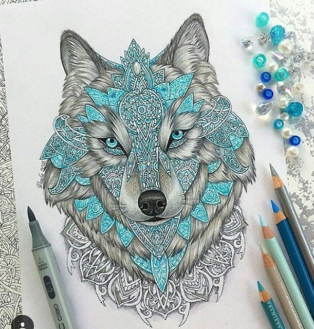 Entrancing grey-and-turquoise wolf tattoo design
