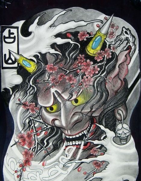 Evil japanese devil with decorated horns and cherry blossom tattoo design