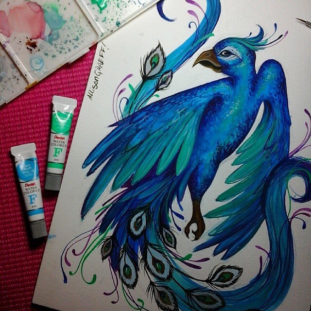 Excellent blue-color peacock tattoo design