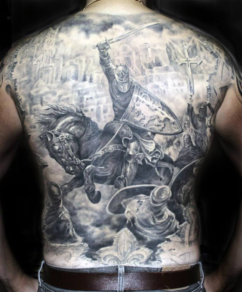 Fighting knight on hourse tattoo on back