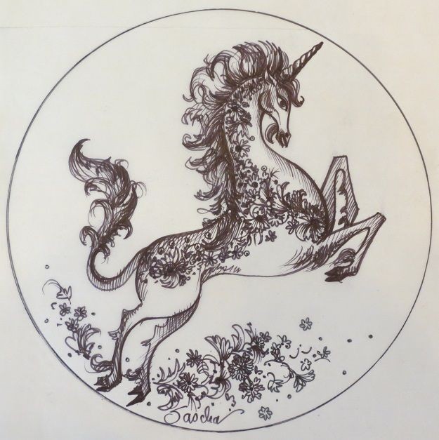 Floral-patterned jumping unicorn in circle frame tattoo design