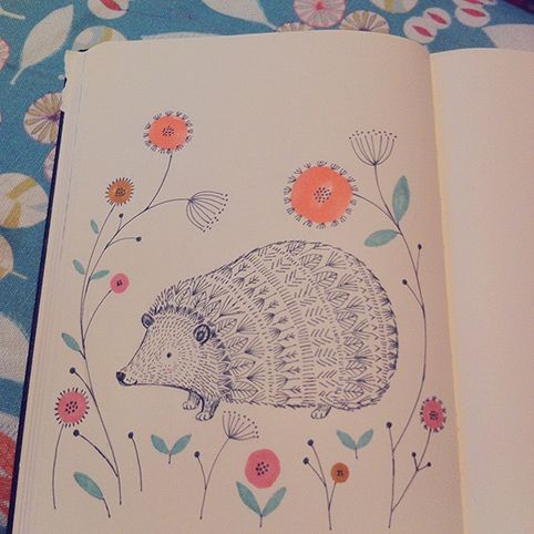 Folk printed hedgehog and funny flowers tattoo design