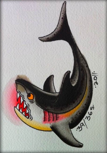 Frightened colorful shark in old school style tattoo design