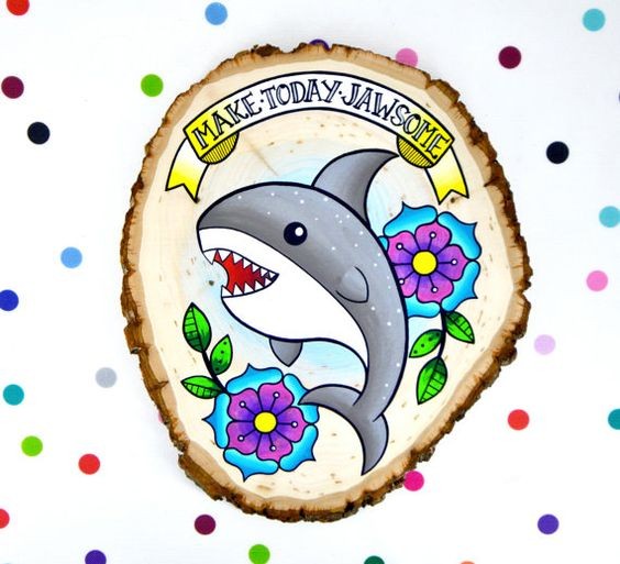 Funny cartoon shark with old school style flowers tattoo design