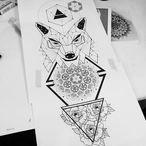 Geometric wolf head with mandala and rises tattoo design