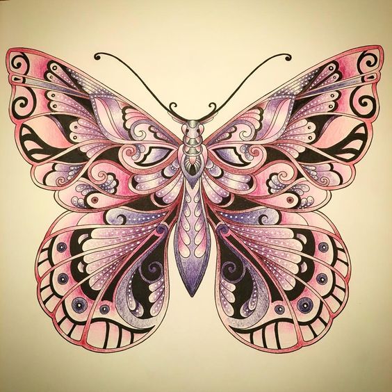 Girly pink butterfly with a lot of decorations tattoo design
